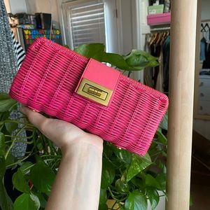 Pink rattan clutch